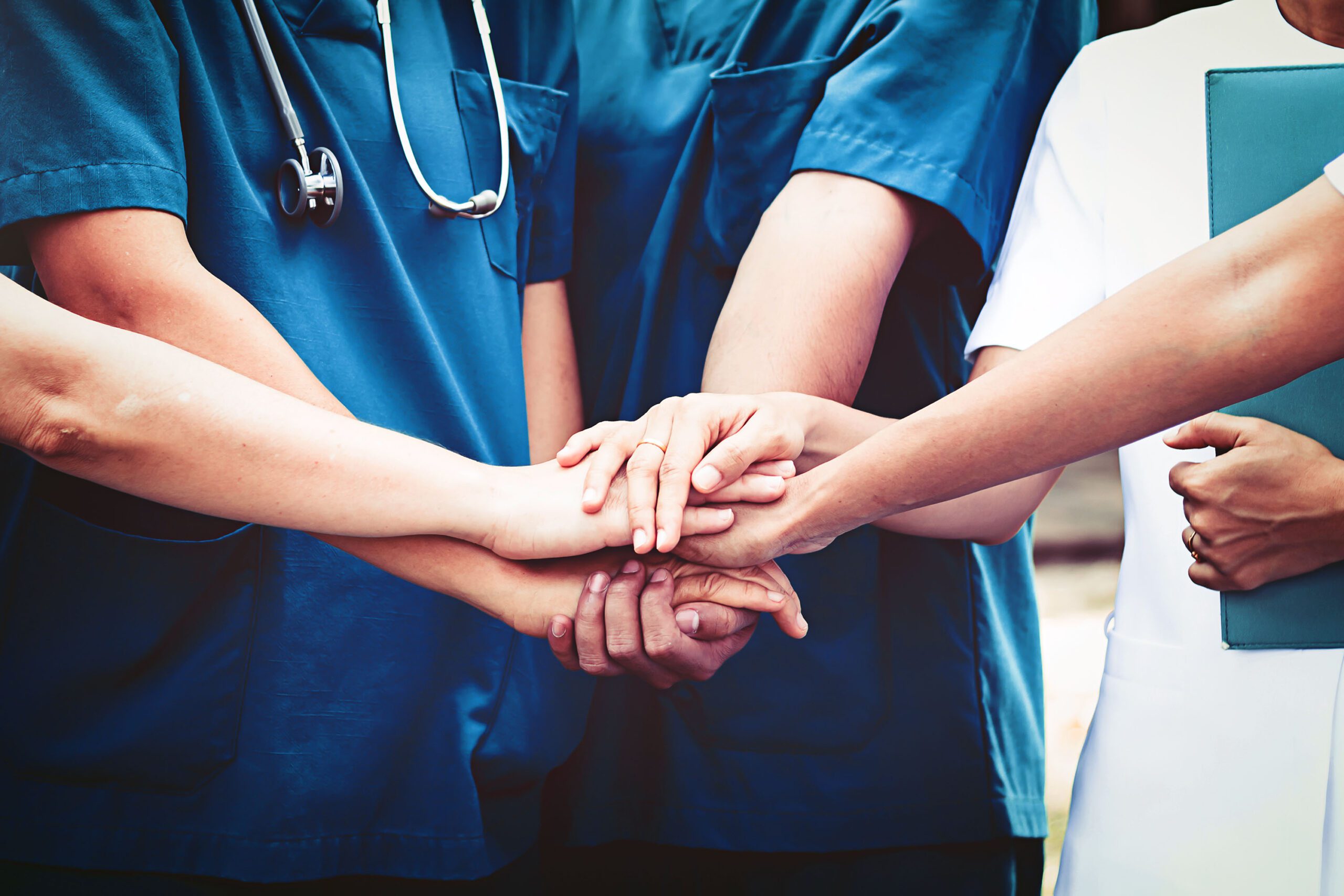 groups of medical workers huddled