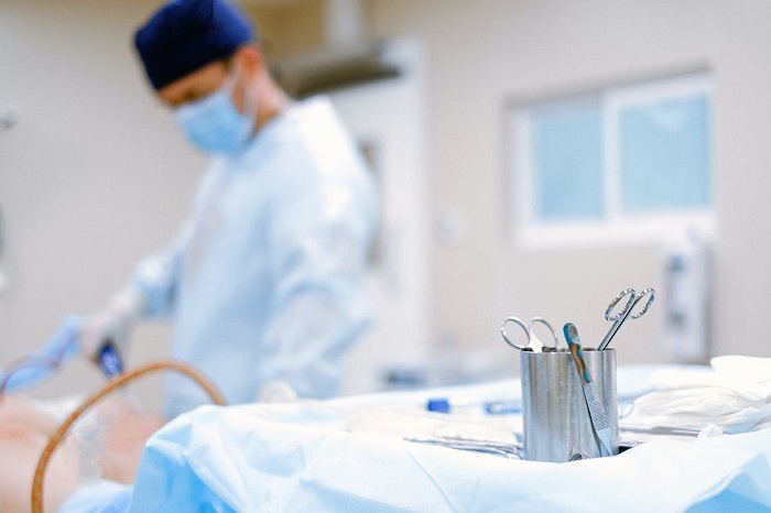 male nurse attending to a patient
